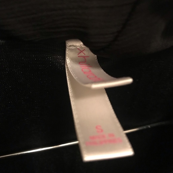 Sheer Peplum-style Black Sleeveless Blouse - Picture 3 of 3